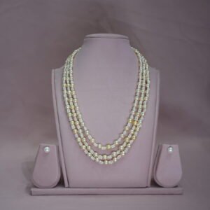 Golden akoya pearls with seed pearls